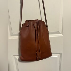 Coach Nicolas bucket bag (#9946) tan leather,drawstring closure, brass hardware